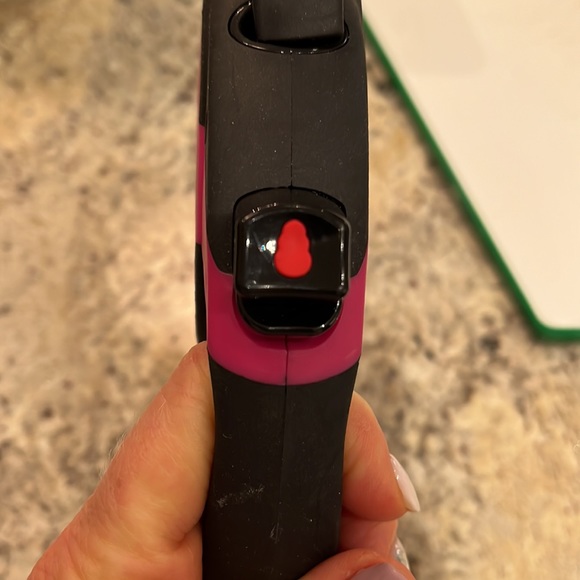 Kong retractable pink leash. Approximately 16 ft. Maximum dog weight 45 lbs. - Picture 3 of 5